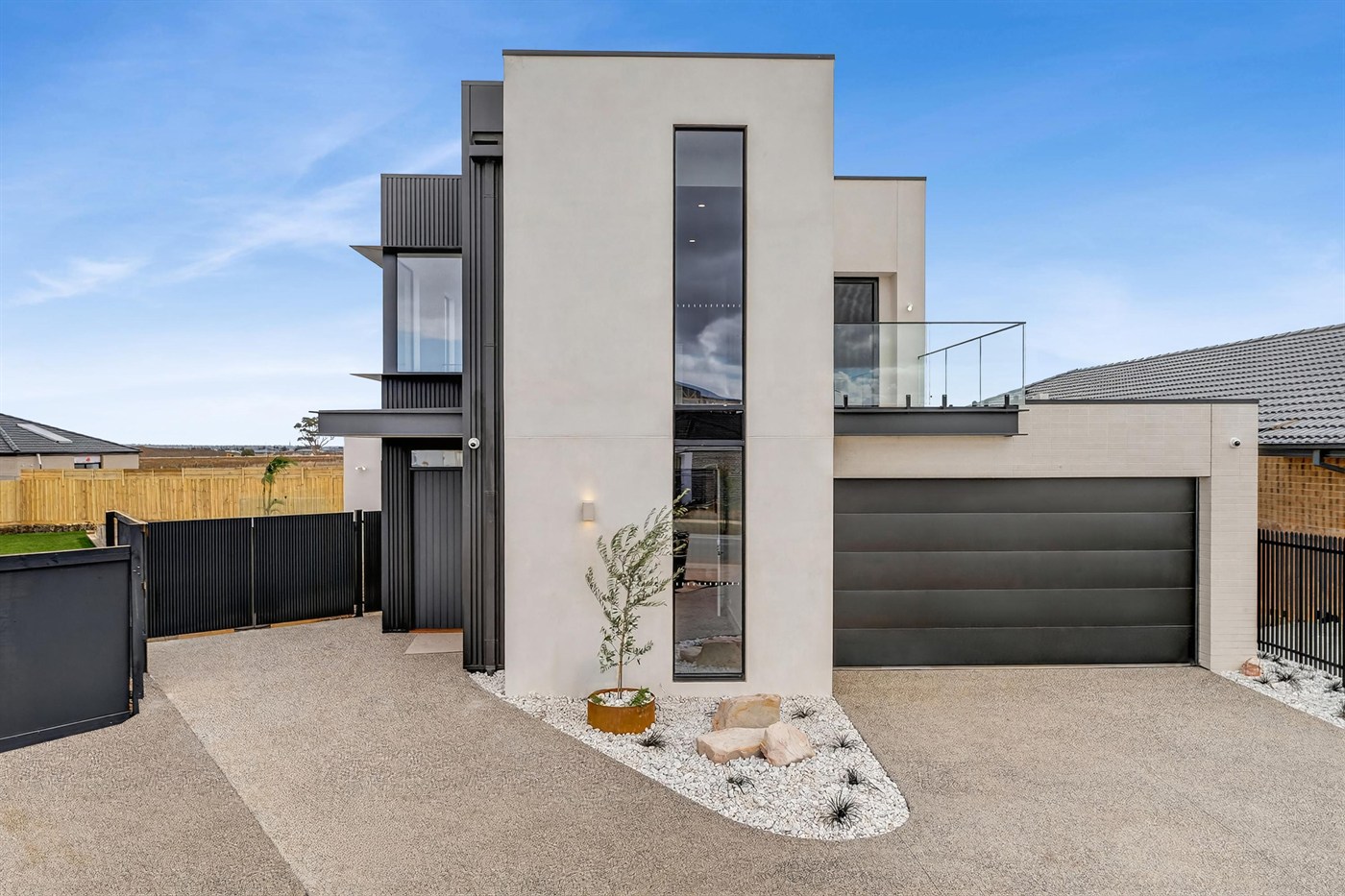 Essendon custom home, contemporary facade with bold street presence